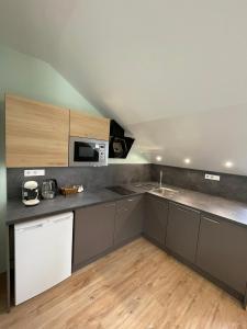 Cucina o angolo cottura di Apartmány penzion Jasmín