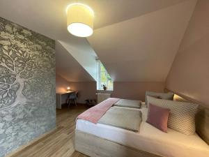 Postel nebo postele na pokoji v ubytování Apartmány Jasmín