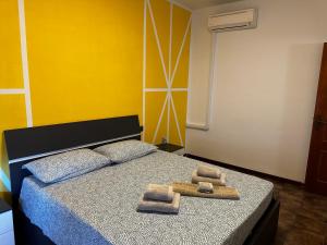 Postel nebo postele na pokoji v ubytování Beppo’s Domus