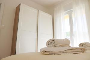 Postel nebo postele na pokoji v ubytování Apartman VESNA II + 17 fotografií