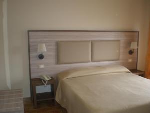 Postel nebo postele na pokoji v ubytování Aparthotel Amelia Dream View