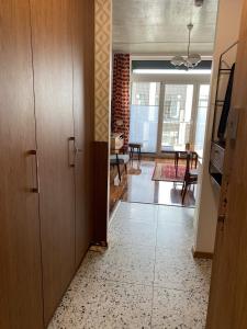 a hallway with a living room and a dining room at Lux Lotnisko in Wrocław