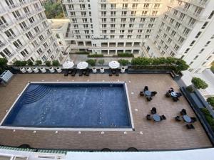 an overhead view of a swimming pool in a building at The Grace Residency, Lucknow in Lucknow