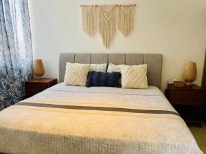 Postel nebo postele na pokoji v ubytování Charming and Cozy Condo San Blas + 5 fotografií