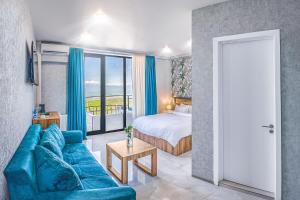 Voodi või voodid majutusasutuse Villaggio Mirzaani Resort toas