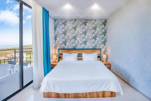 Voodi või voodid majutusasutuse Villaggio Mirzaani Resort toas