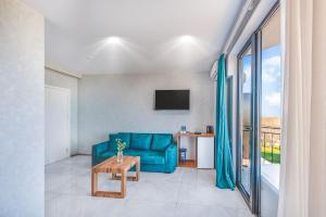 Televiisor ja/või meelelahutuskeskus majutusasutuses Villaggio Mirzaani Resort