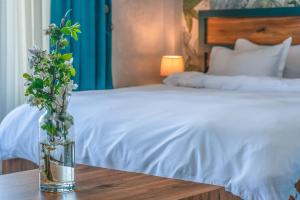 Voodi või voodid majutusasutuse Villaggio Mirzaani Resort toas