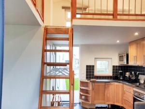 Η κουζίνα ή μικρή κουζίνα στο 4 person holiday home in GLOMMEN-By Traum