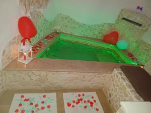a model of a pool in a toy house at Suite 800 in Ostuni
