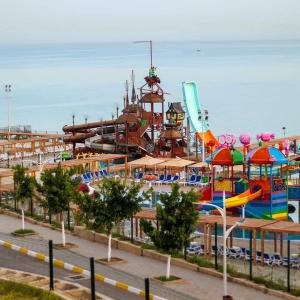 a water park with a roller coaster and slides at Appartement F3 Fil-Fila Skikda in Skikda