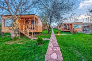 Zahrada ubytování Villaggio Mirzaani Resort
