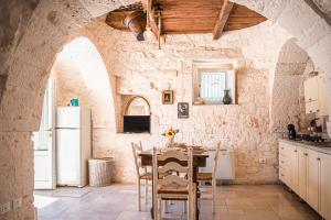 Η κουζίνα ή μικρή κουζίνα στο Trulli Beauty PINNACOLO