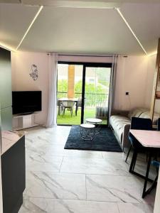 Μια τηλεόραση ή/και κέντρο ψυχαγωγίας στο Appartement 50m2 spa privé
