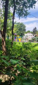 a park with a playground with a play park at Holidays Apartment in Constanţa