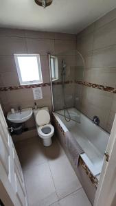 Ванная комната в Summersands North Beach Durban