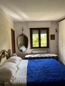 En eller flere senger på et rom på Casa Anna a Pietrasanta in Toscana
