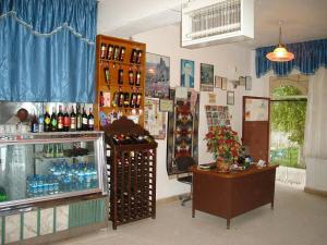 a room with a store with bottles of wine at Akar Hotel in Ihlara