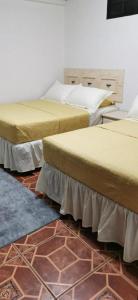 Postel nebo postele na pokoji v ubytování Apartamentos Casco Historico