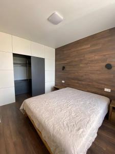 Katil atau katil-katil dalam bilik di Nyvky like Home - Good for family