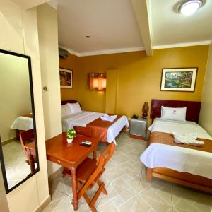 Hotel Ventura Isabel客房内的一张或多张床位