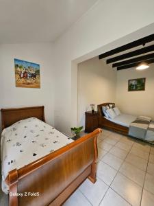 Ένα ή περισσότερα κρεβάτια σε δωμάτιο στο Appartement GIVERNY +1 φωτογραφίες