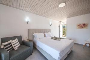Postel nebo postele na pokoji v ubytování Leonidas Resort