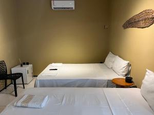 VILA LITORANEA Hotel客房内的一张或多张床位