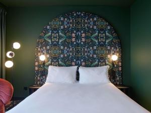 Rúm í herbergi á ibis Styles Rotterdam Ahoy
