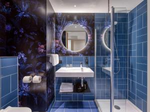 Baðherbergi á ibis Styles Rotterdam Ahoy