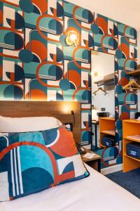 Postel nebo postele na pokoji v ubytování Best Western Metz Centre Gare