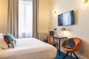 Postel nebo postele na pokoji v ubytování Best Western Metz Centre Gare