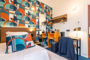 Postel nebo postele na pokoji v ubytování Best Western Metz Centre Gare