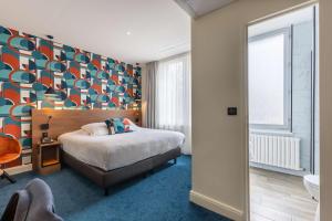 Postel nebo postele na pokoji v ubytování Best Western Metz Centre Gare