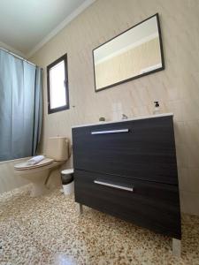 Kúpeľňa v ubytovaní El Olivar Corralejo Beach