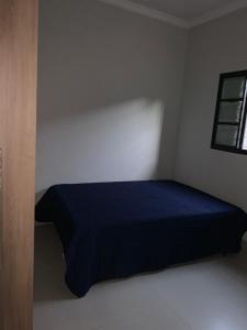 Postel nebo postele na pokoji v ubytování Um lar, muita diversão.