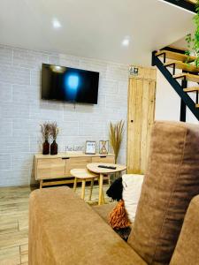 TV a/nebo společenská místnost v ubytování Cantinho das Pedras + 25 fotografií