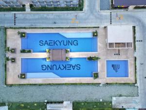 an overhead view of a building with the words saayuing and drawings at Condo near Airport in Lapu Lapu City