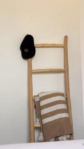 a shelf with a hat on a wall at W Surf Morocco in Agadir