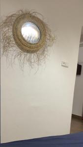 a wreath hanging on a wall in a room at W Surf Morocco in Agadir