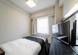 TV a/nebo společenská místnost v ubytování APA Hotel Kokura Ekimae