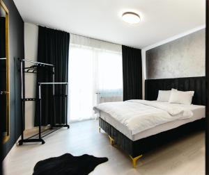 Postelja oz. postelje v sobi nastanitve Modern Lux Apartment 3