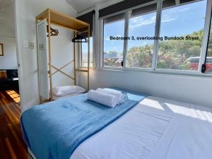 Ένα ή περισσότερα κρεβάτια σε δωμάτιο στο Central 4-Bedroom Haven in Townsville
