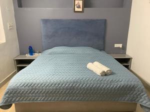 Postel nebo postele na pokoji v ubytování Green Serene Abode