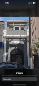 a car is parked in front of a building at Gran Village Hostel in Sao Paulo +8 photos