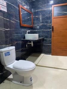 Ένα μπάνιο στο Mango Guesthouse