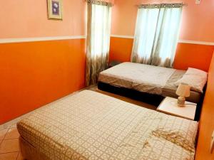 Ein Bett oder Betten in einem Zimmer der Unterkunft Anne Marie Villas