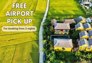 an aerial view of a house with the text free airport pick up at Chez Mimosa Hoi An - LUA Retreat in Hoi An