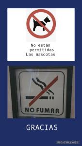 Un signe qui dit qu'aucun signe n'autorise les masoscopes dans l'établissement Magnífico Alojamiento en el centro, à Valdepeñas
