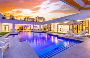 a large swimming pool in a house at Old Town Scottsdale Luxury Villa - Heated Pool, Spa, Rooftop Deck, Sauna, Speakeasy in Scottsdale